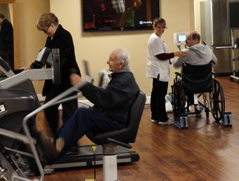 Resident using SciFit exercise machine